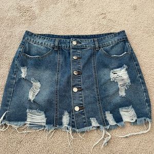 Denim Ripped Mini skirt.